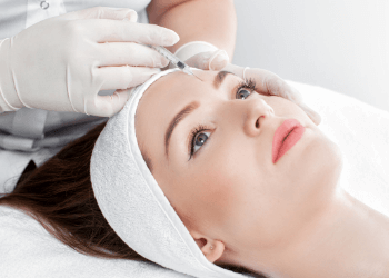 Woman having an aesthetic treatment at out skin clinic in inverness